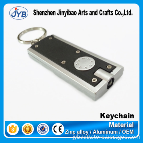 popular design cheap promotional LED plastic keychain with custom logo
